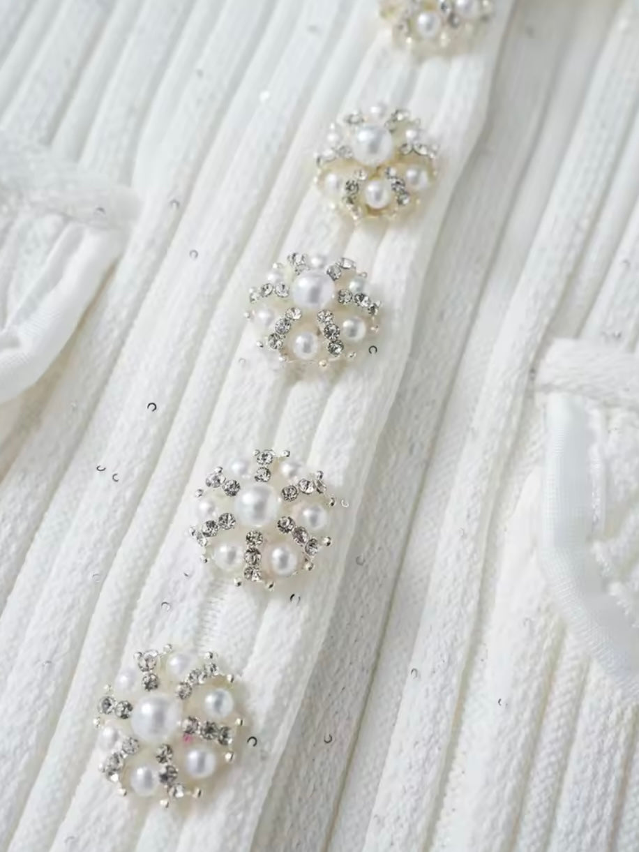 Rippstrickkleid mit Perlenknöpfen