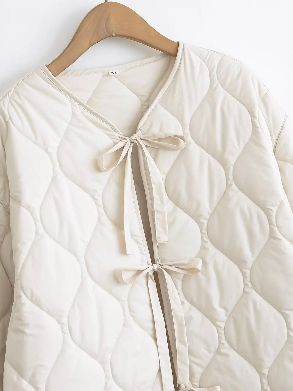 Gesteppte Übergangsjacke mit Schleifen