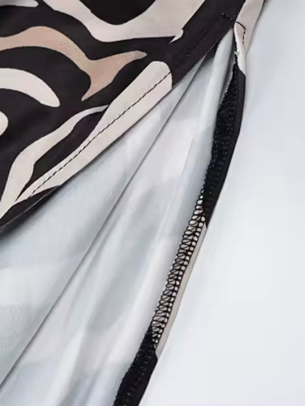Cocktailkleid mit Spitzeneinsatz und Animalprint