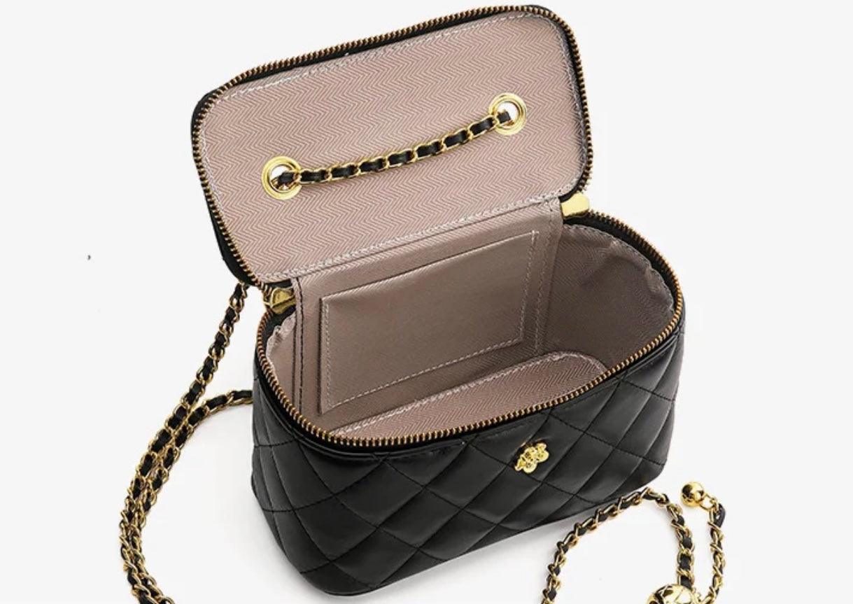 Gesteppte Koffer-Handtasche mit goldenen Details - Sorentis