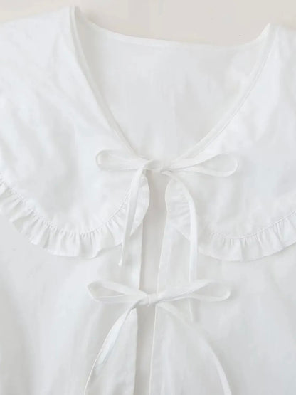 Vorne gebundene Schößchen-Bluse mit Bubikragen