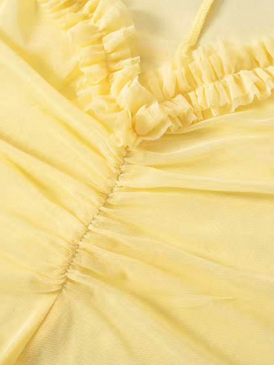 Fliesendes Meshkleid mit Rüschen-Saum