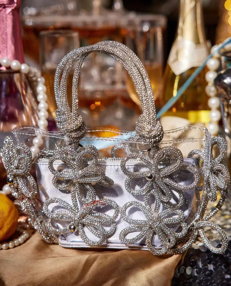 Glitzernde transparente Handtasche mit Strassblumen und Innentasche - Sorentis